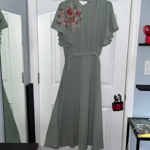 Embroiled floral dress with bell shaped sleeve- open back